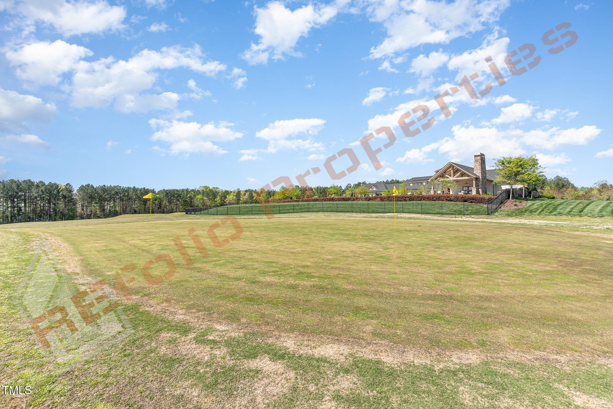 1001 Covered Bridge Trail Chapel Hill, NC 27517 - Photo 38 of 41 a view of a lake with houses in the back