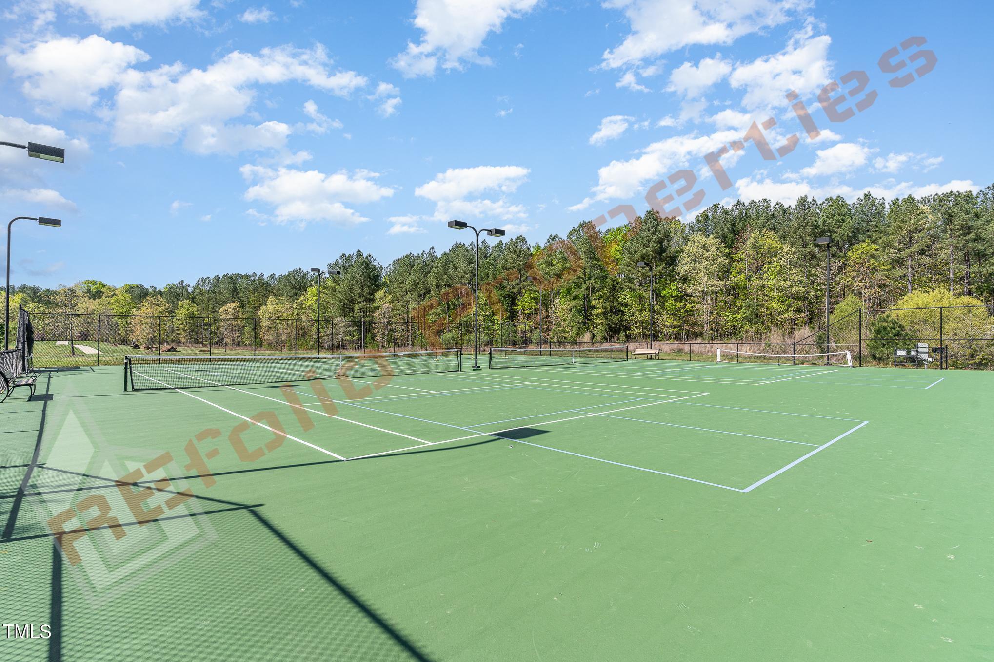 1001 Covered Bridge Trail Chapel Hill, NC 27517 - Photo 39 of 41 a view of an outdoor space and tennis court
