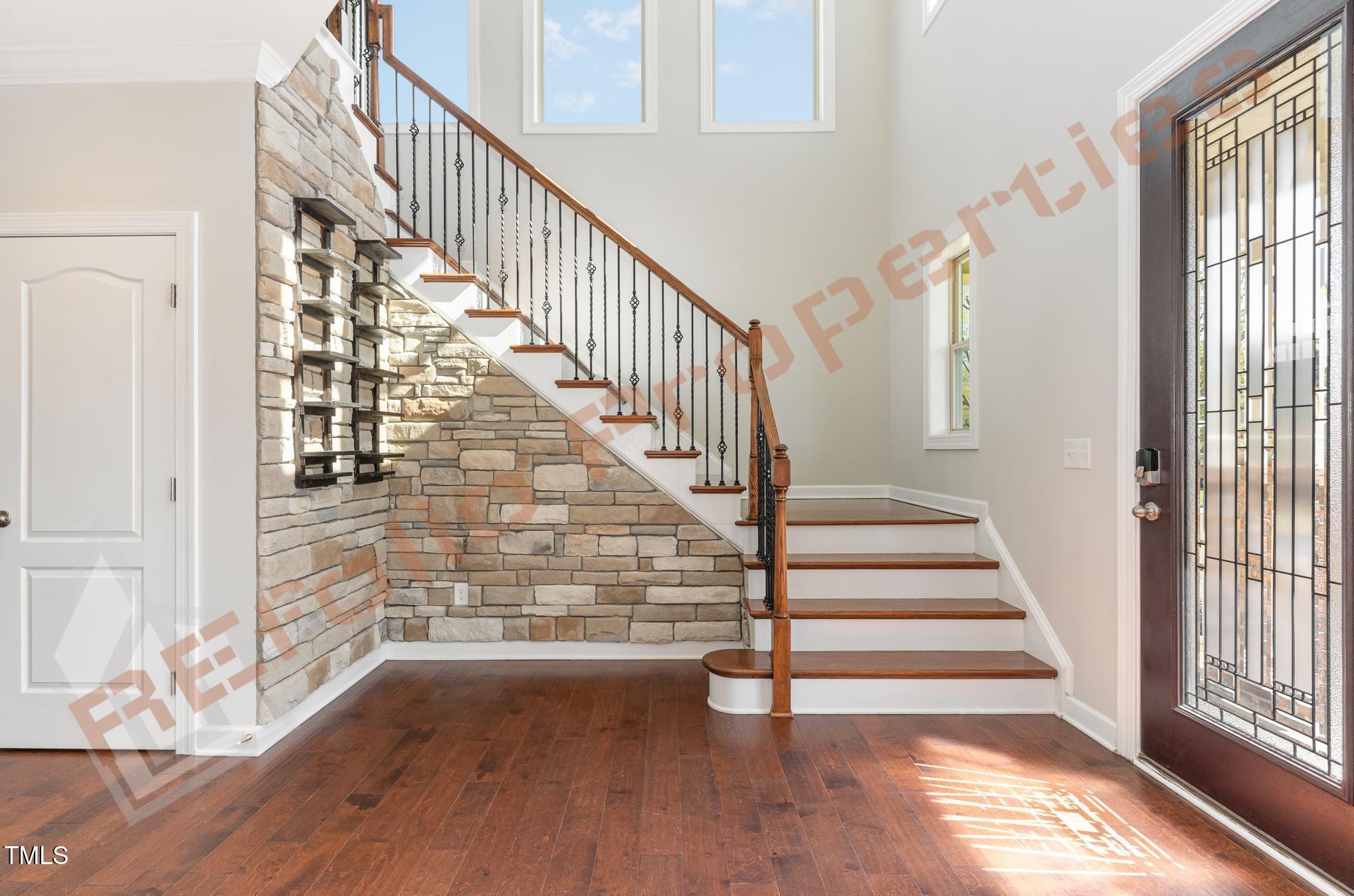 1001 Covered Bridge Trail Chapel Hill, NC 27517 - Photo 4 of 41 a view of entryway and hall with wooden floor