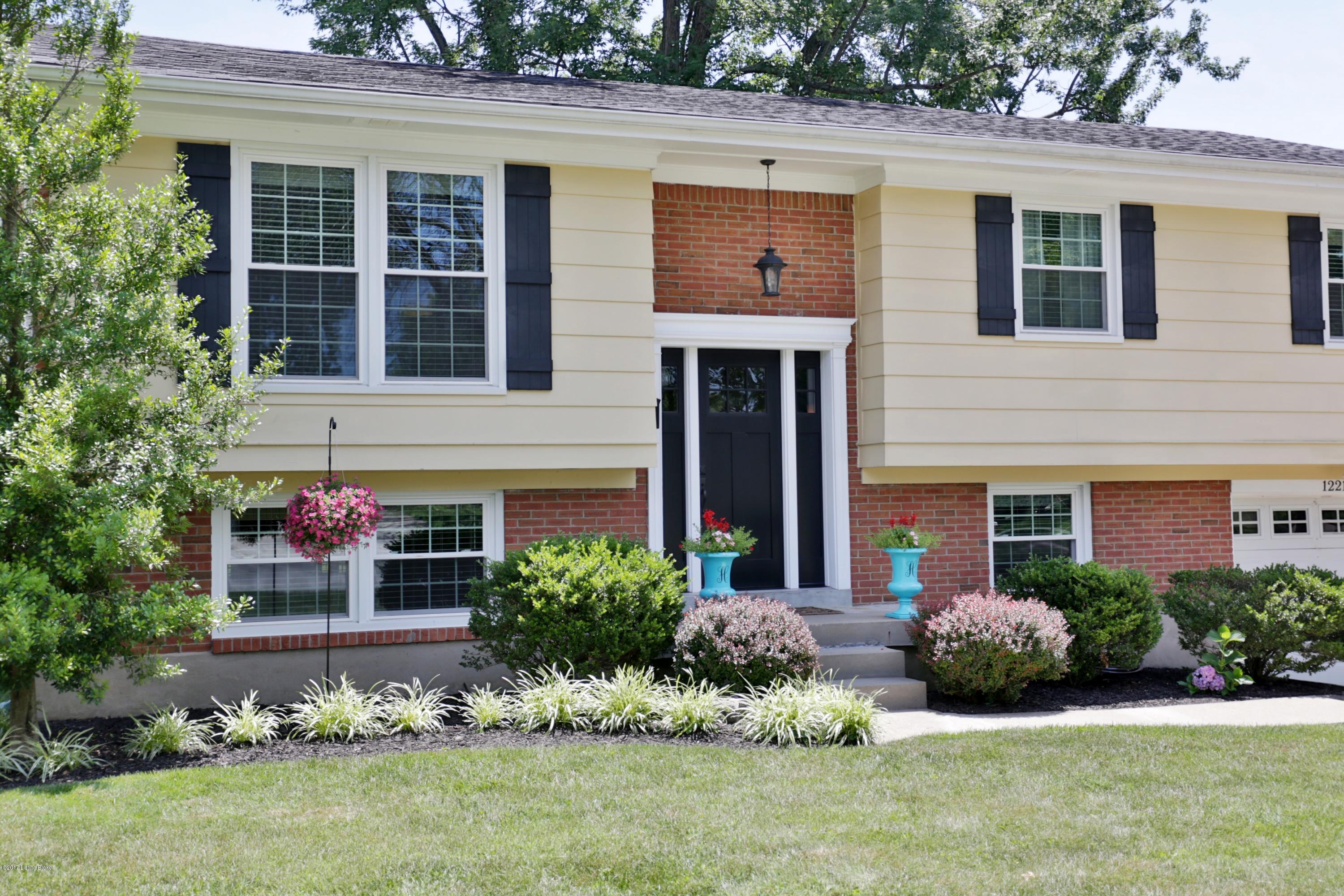New front door, windows and shutters.
