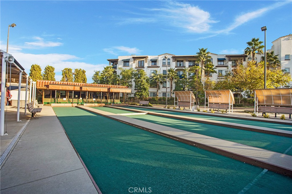 662 Via Los Altos, Unit P Laguna Woods, CA 92637 - Photo 33 of 46 a view of building with yard