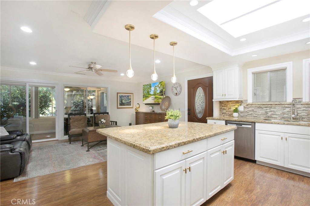 662 Via Los Altos, Unit P Laguna Woods, CA 92637 - Photo 5 of 46 a view of a kitchen counter top space with granite countertop living room