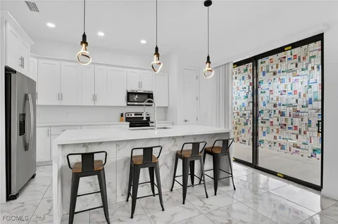 $475,000 | 2513 69th Street West, Lehigh Acres, FL 33971