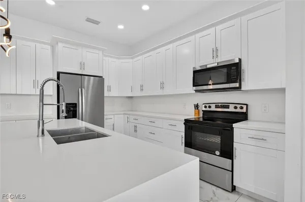 $465,000 | 2513 69th Street West, Lehigh Acres, FL 33971