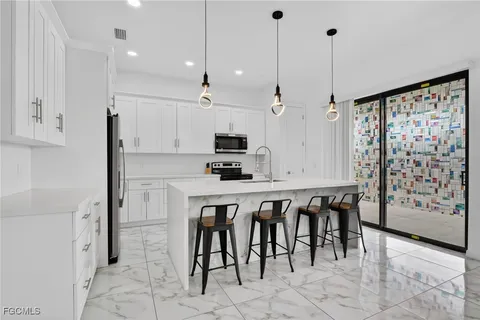 $475,000 | 2513 69th Street West, Lehigh Acres, FL 33971