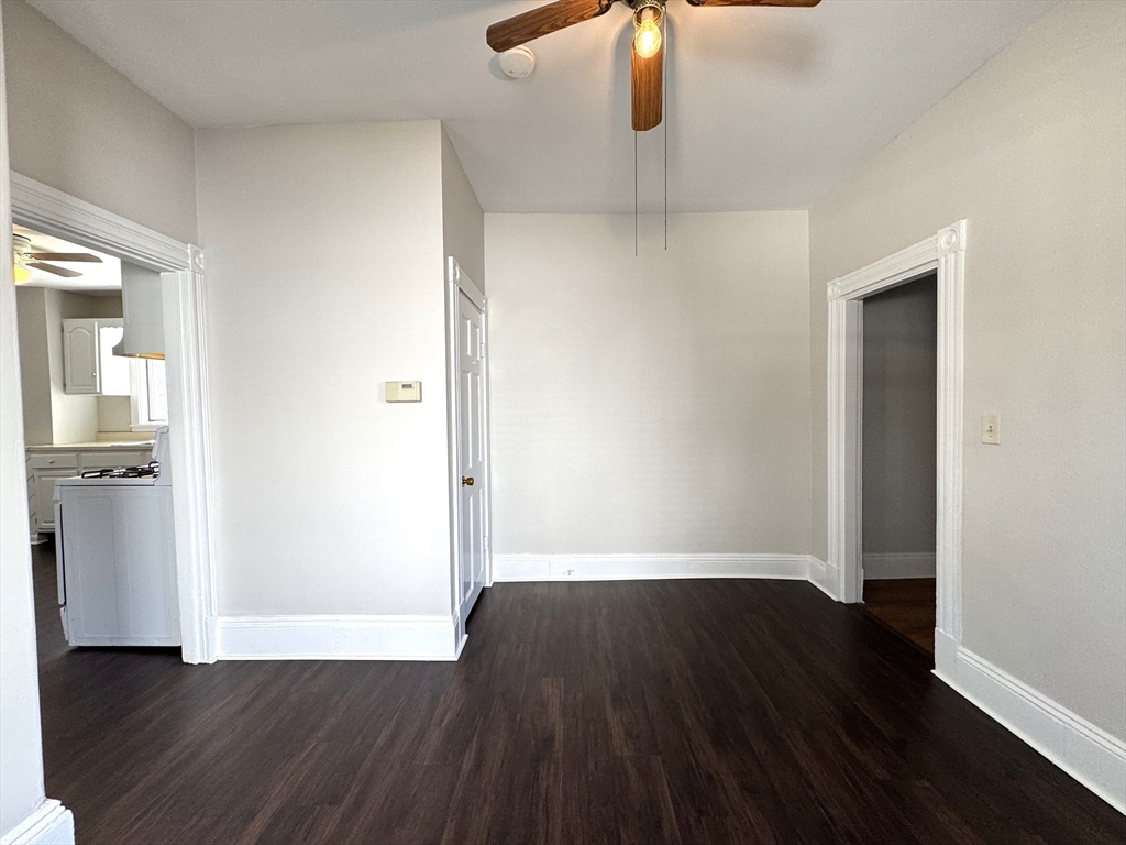 69 Cleveland Avenue, Unit 1 Everett, MA 02149 - Photo 5 of 13 a view of empty room with wooden floor
