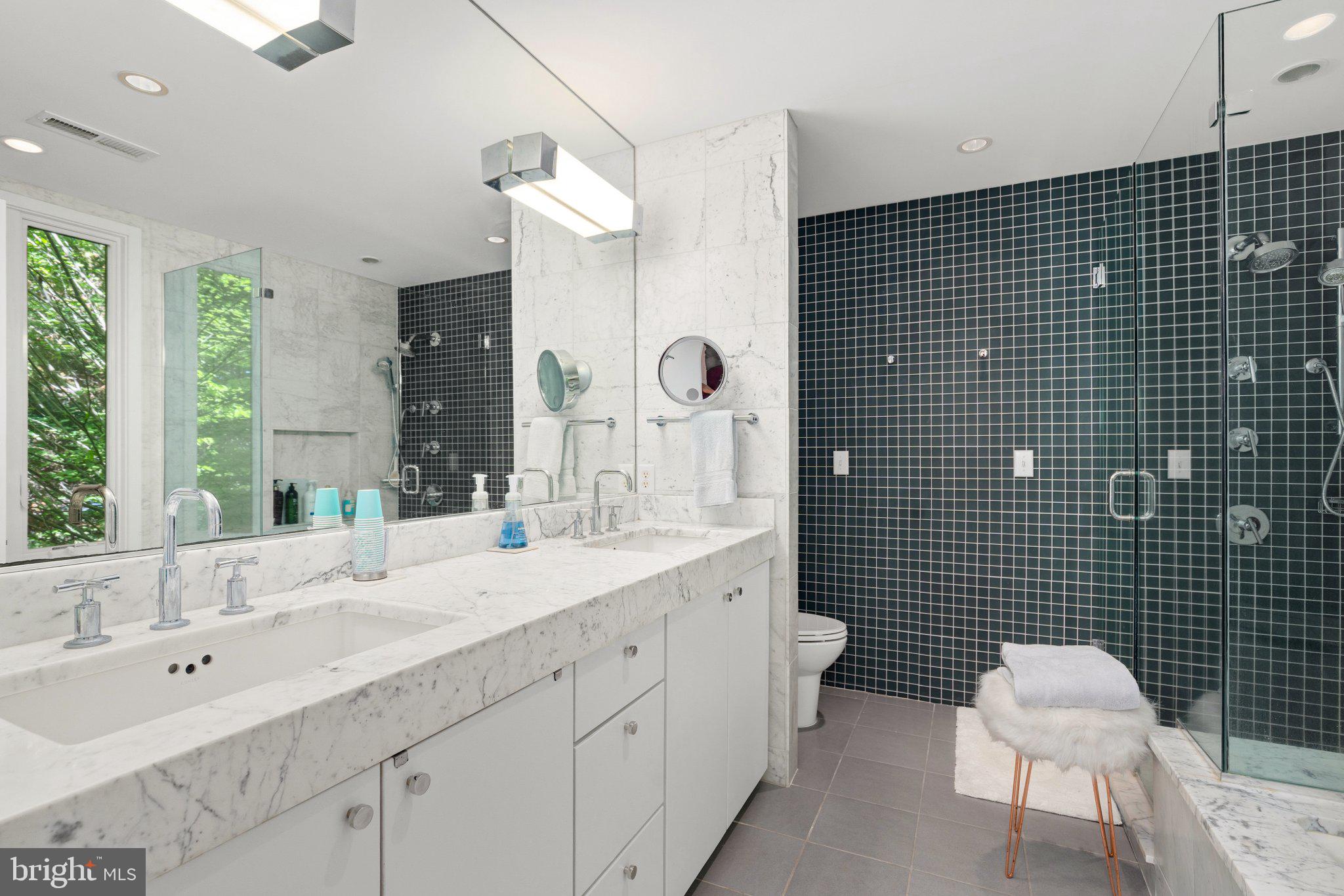 316 Gordon Road Kinsale, VA 22488 - Photo 33 of 45 Sleek modern bathroom with natural light.