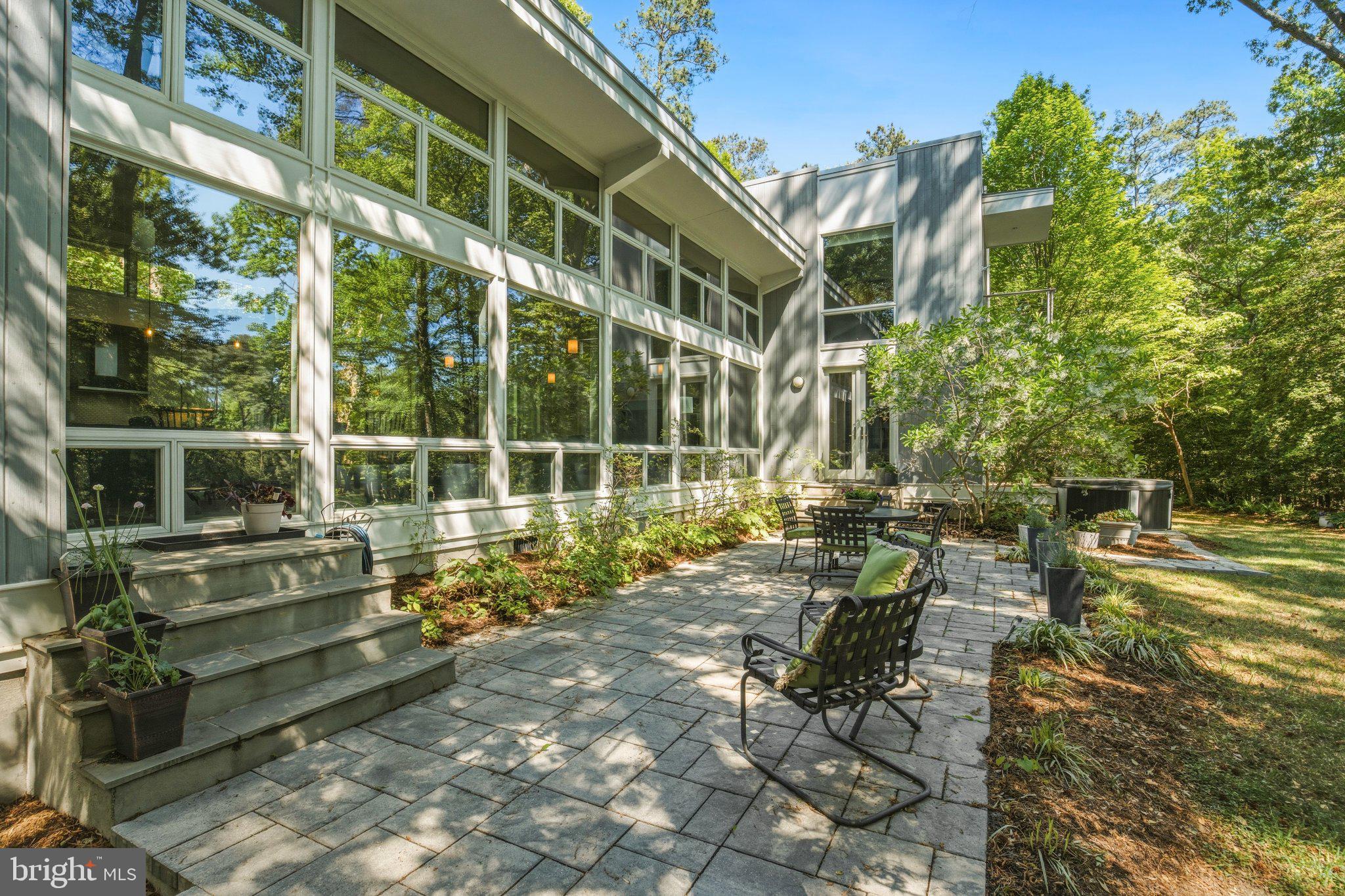 316 Gordon Road Kinsale, VA 22488 - Photo 42 of 45 Serene patio with lush greenery.