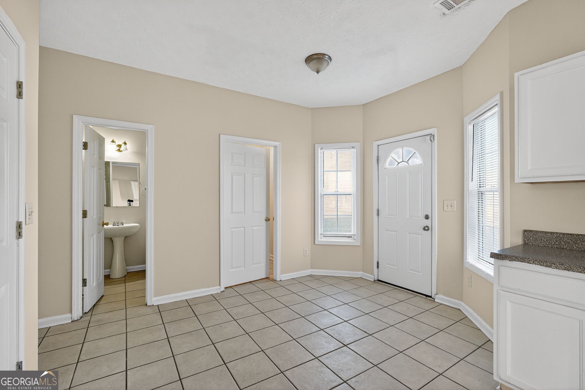 3812 Walnut Path Lithonia, GA 30038 - Photo 17 of 37 a view of a room & entryway with a livingroom