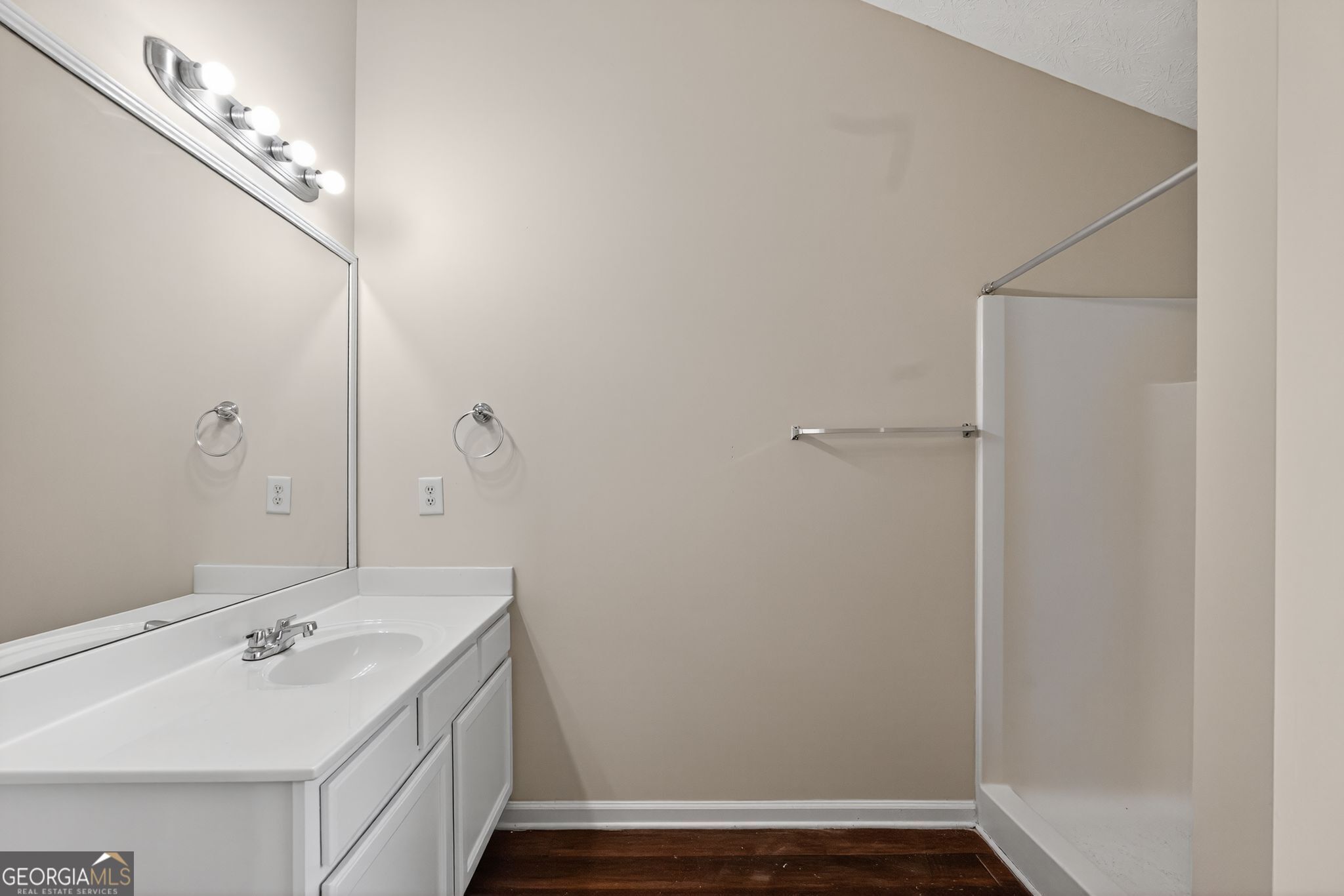 3812 Walnut Path Lithonia, GA 30038 - Photo 19 of 37 a bathroom with a sink and a mirror