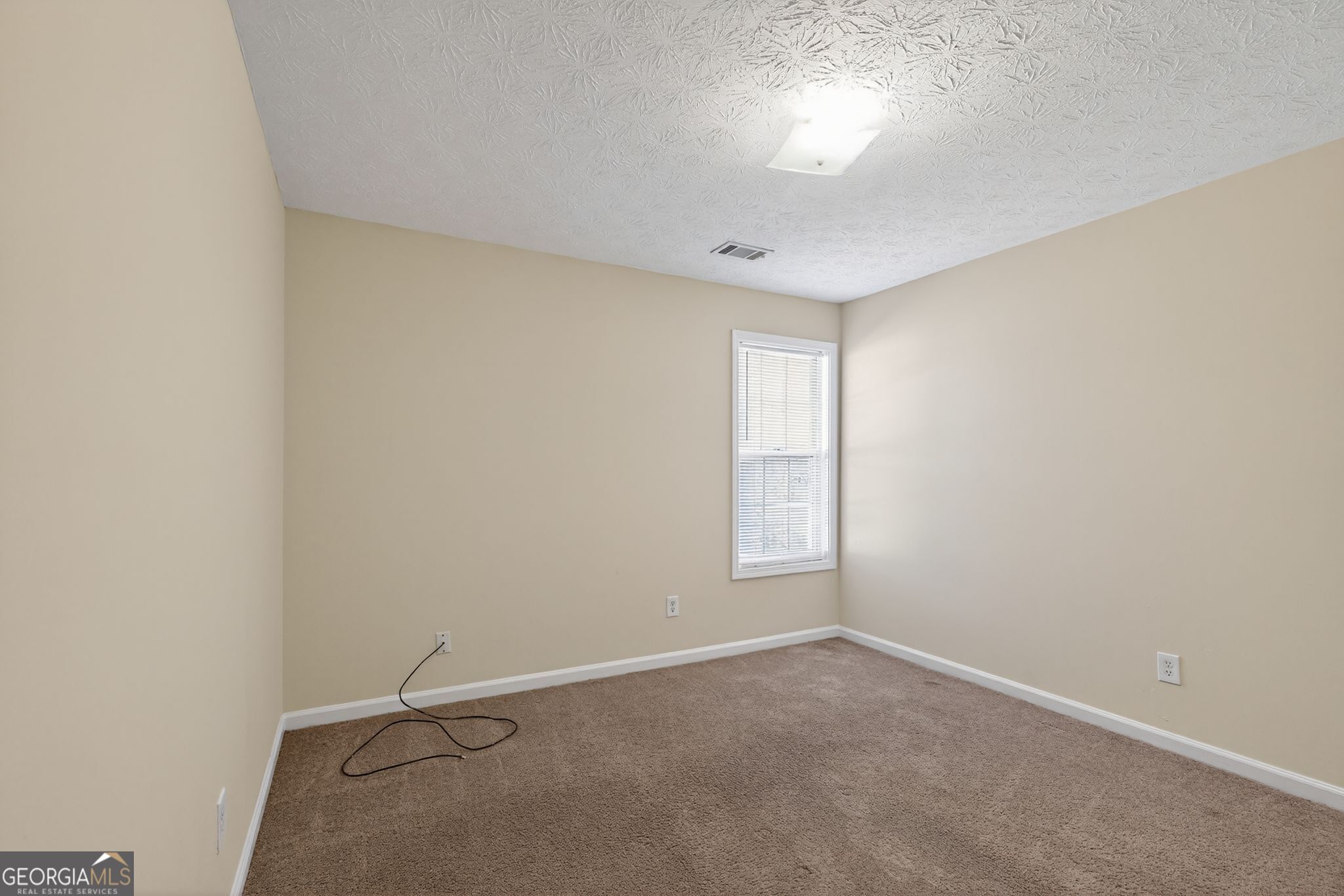 3812 Walnut Path Lithonia, GA 30038 - Photo 29 of 37 an empty room with windows and closet