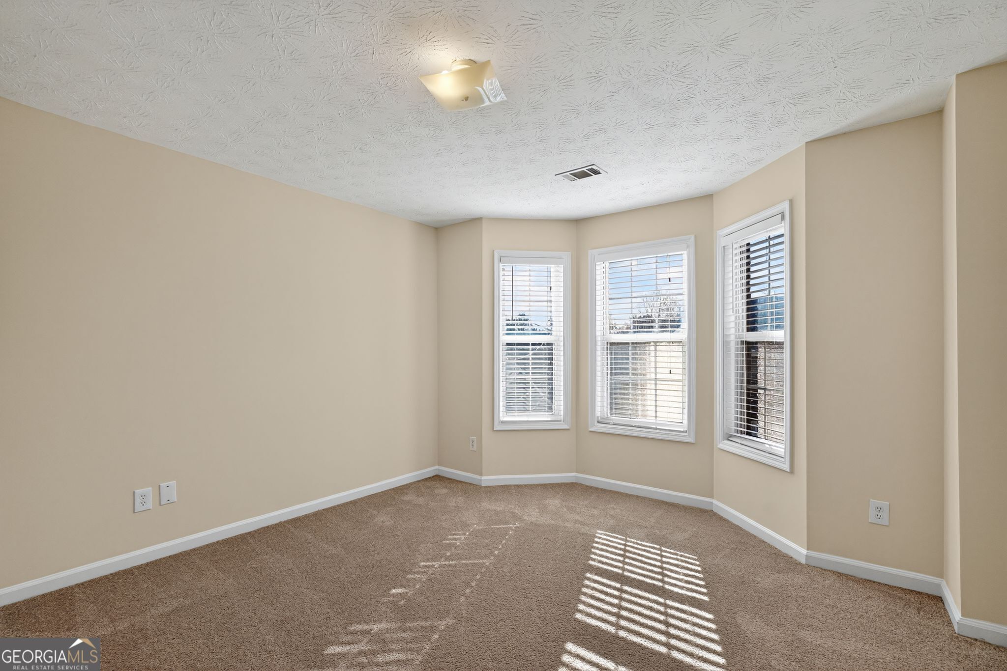 3812 Walnut Path Lithonia, GA 30038 - Photo 32 of 37 a view of an empty room with a window