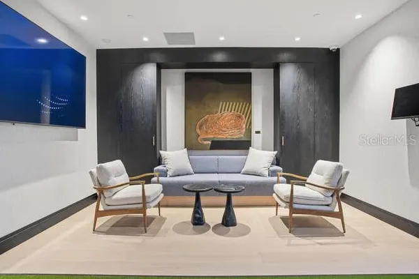 a living room with furniture and a table