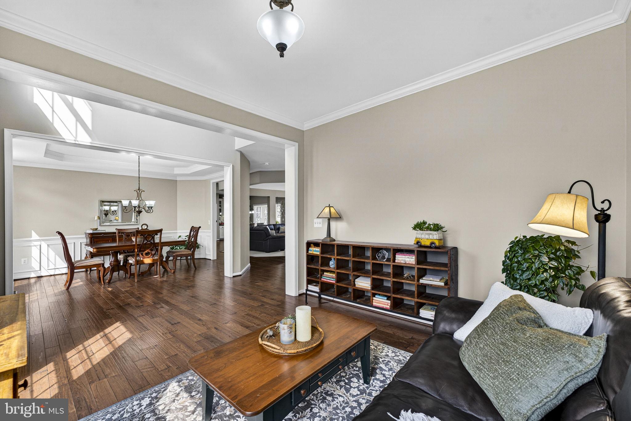 6913 Bitterroot Court Gainesville, VA 20155 - Photo 12 of 56 Living room view to dining room