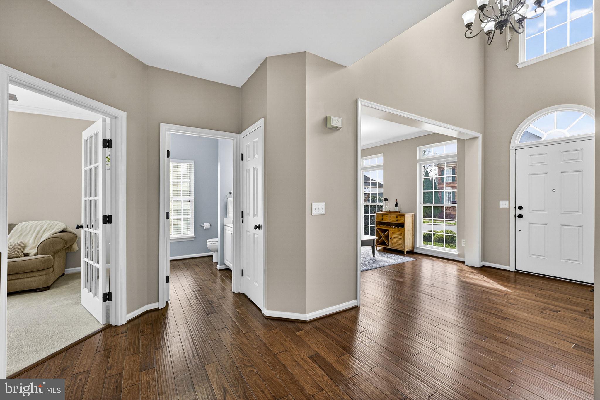 6913 Bitterroot Court Gainesville, VA 20155 - Photo 14 of 56 View showing foyer, LR, powder room & office