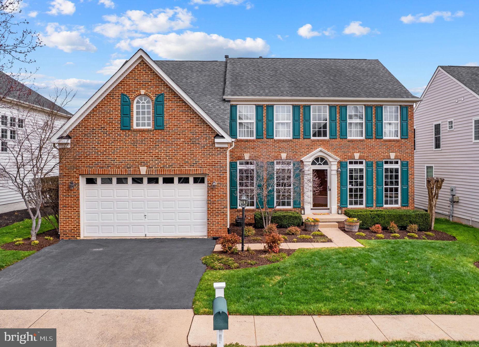 6913 Bitterroot Court Gainesville, VA 20155 - Photo 2 of 56 Colorful landscaping will be popping soon