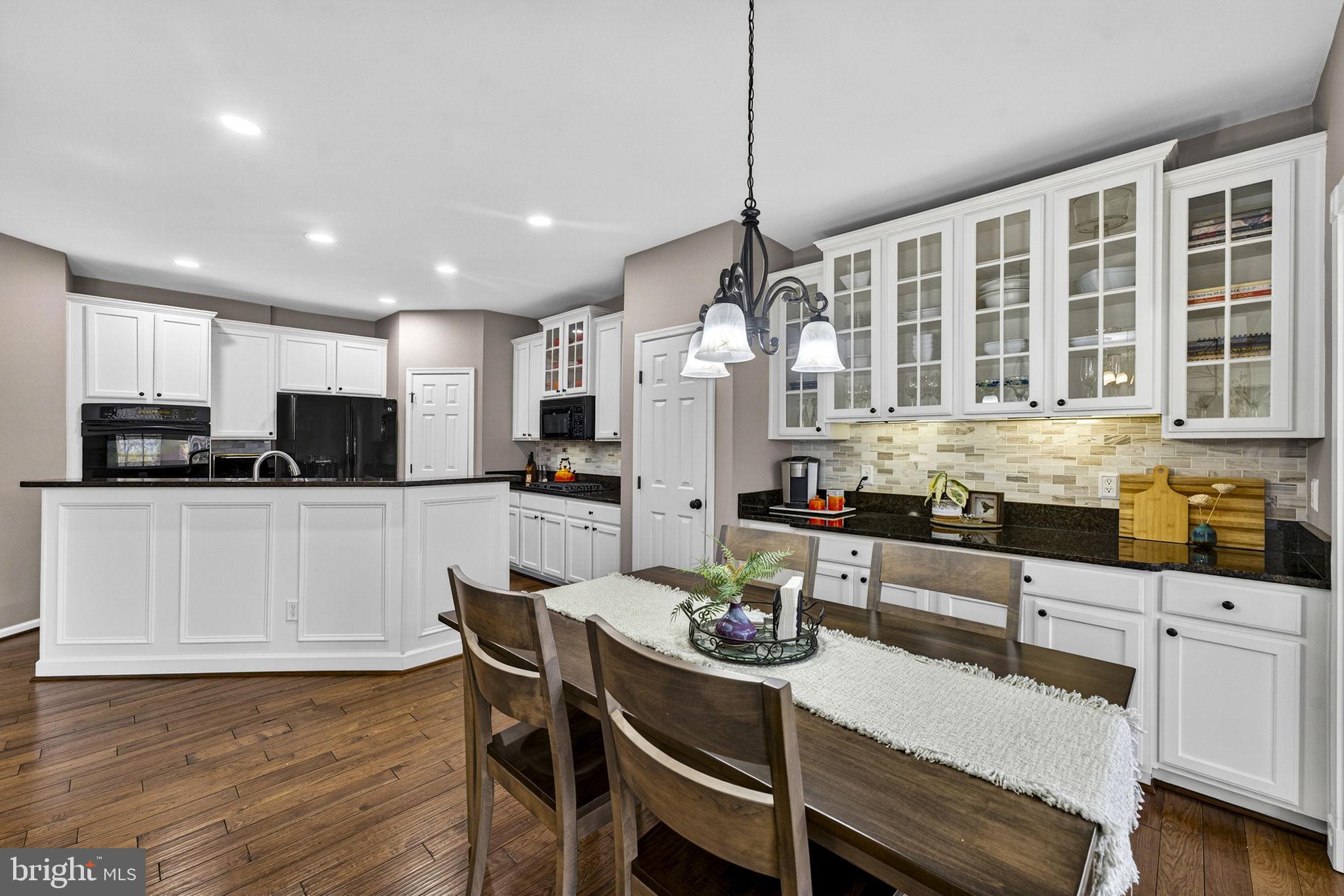6913 Bitterroot Court Gainesville, VA 20155 - Photo 23 of 56 Look at all the glass cabinetry