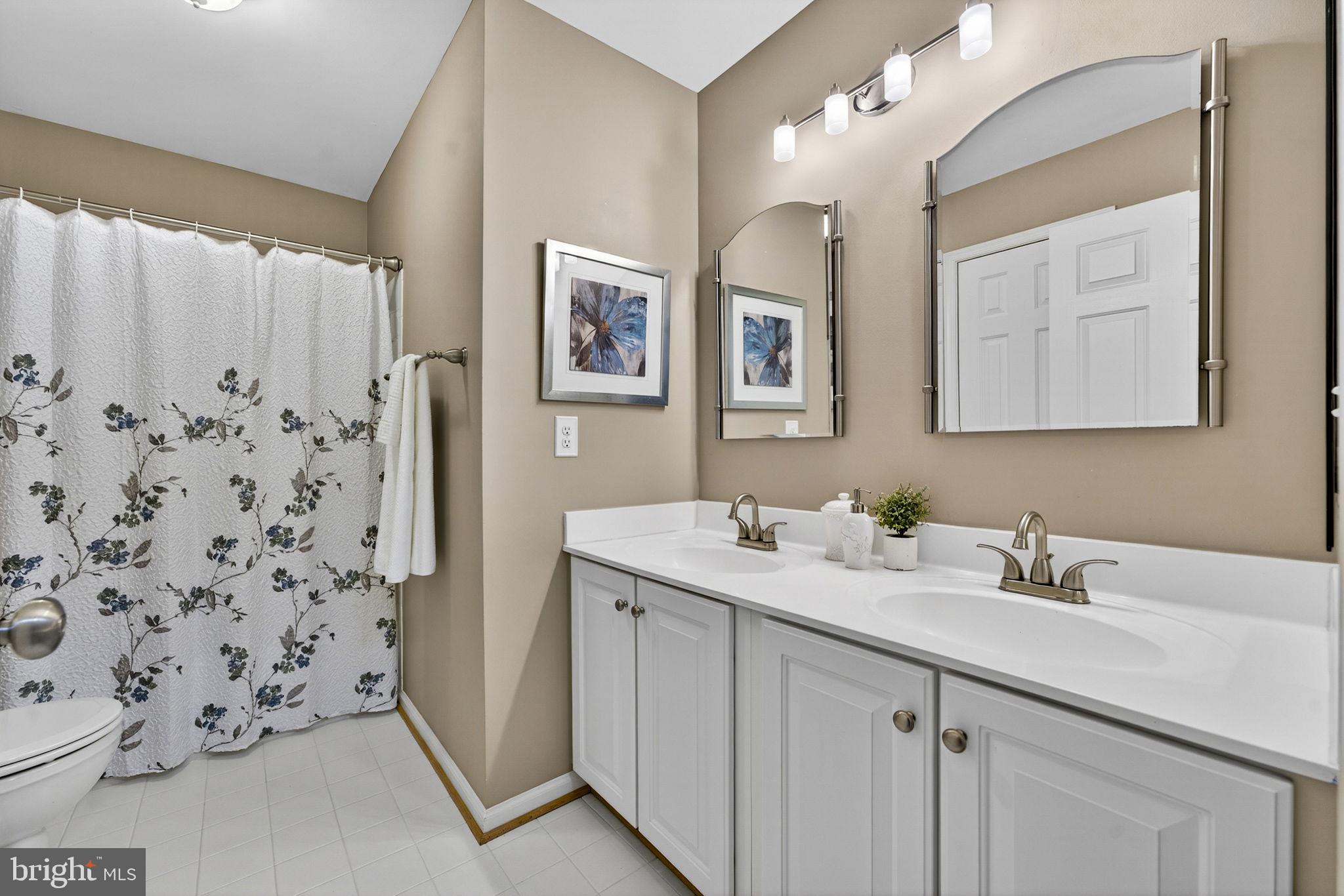 6913 Bitterroot Court Gainesville, VA 20155 - Photo 40 of 56 Hall bath w/double sinks