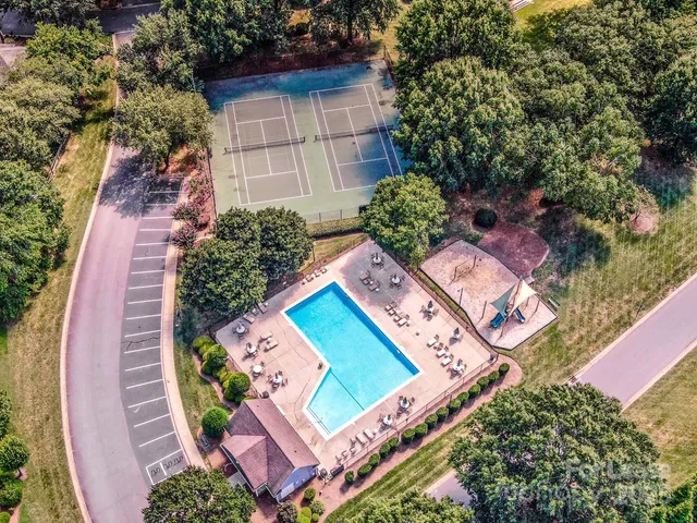 a view of a swimming pool with a patio