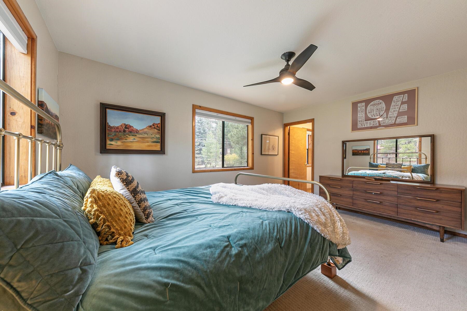 10455 Regency Circle Truckee, CA 96161 - Photo 13 of 28 a bedroom with a large bed and a window