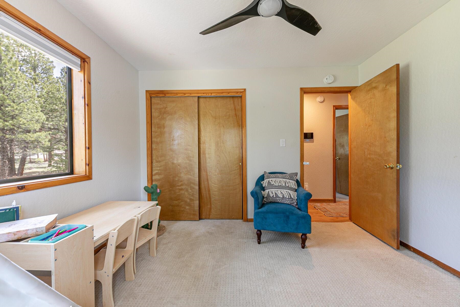 10455 Regency Circle Truckee, CA 96161 - Photo 19 of 28 a bedroom with a bed and a window