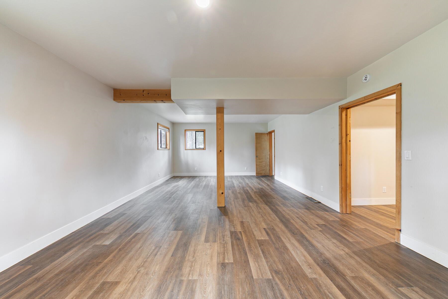 10455 Regency Circle Truckee, CA 96161 - Photo 20 of 28 wooden floor in an empty room with a window