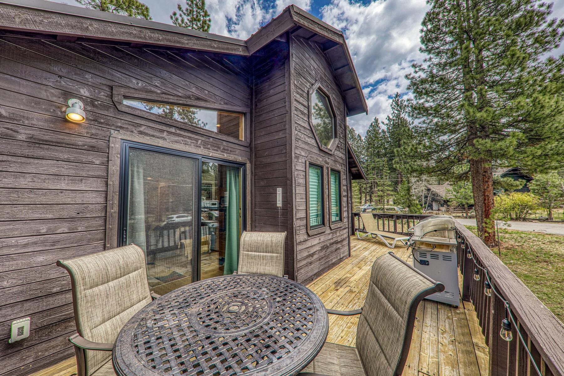 10455 Regency Circle Truckee, CA 96161 - Photo 25 of 28 a view of a patio with couches chairs and a wooden floor