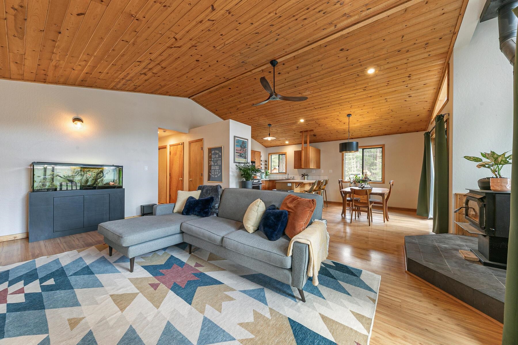 10455 Regency Circle Truckee, CA 96161 - Photo 5 of 28 a living room with furniture and a flat screen tv