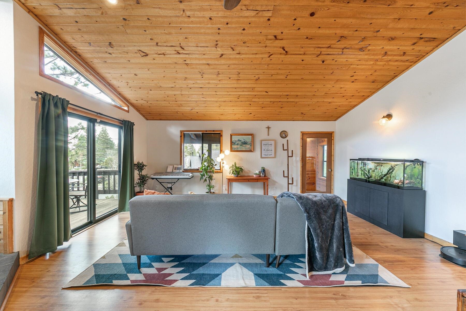 10455 Regency Circle Truckee, CA 96161 - Photo 6 of 28 a living room with furniture wooden floor and a table