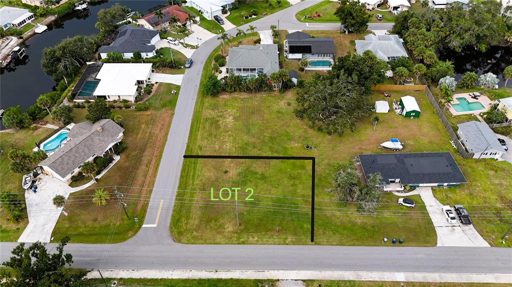 Dona Way Nokomis, FL 34275 - Photo 3 of 6 an aerial view of residential houses with yard