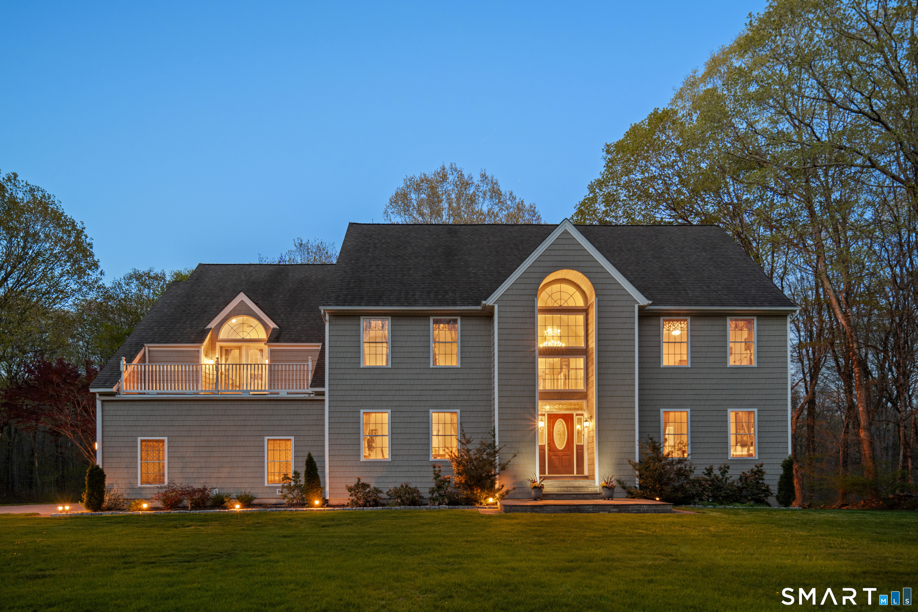 420 Summer Hill Road Madison, CT 06443 - Photo 1 of 40 a front view of a house with garden
