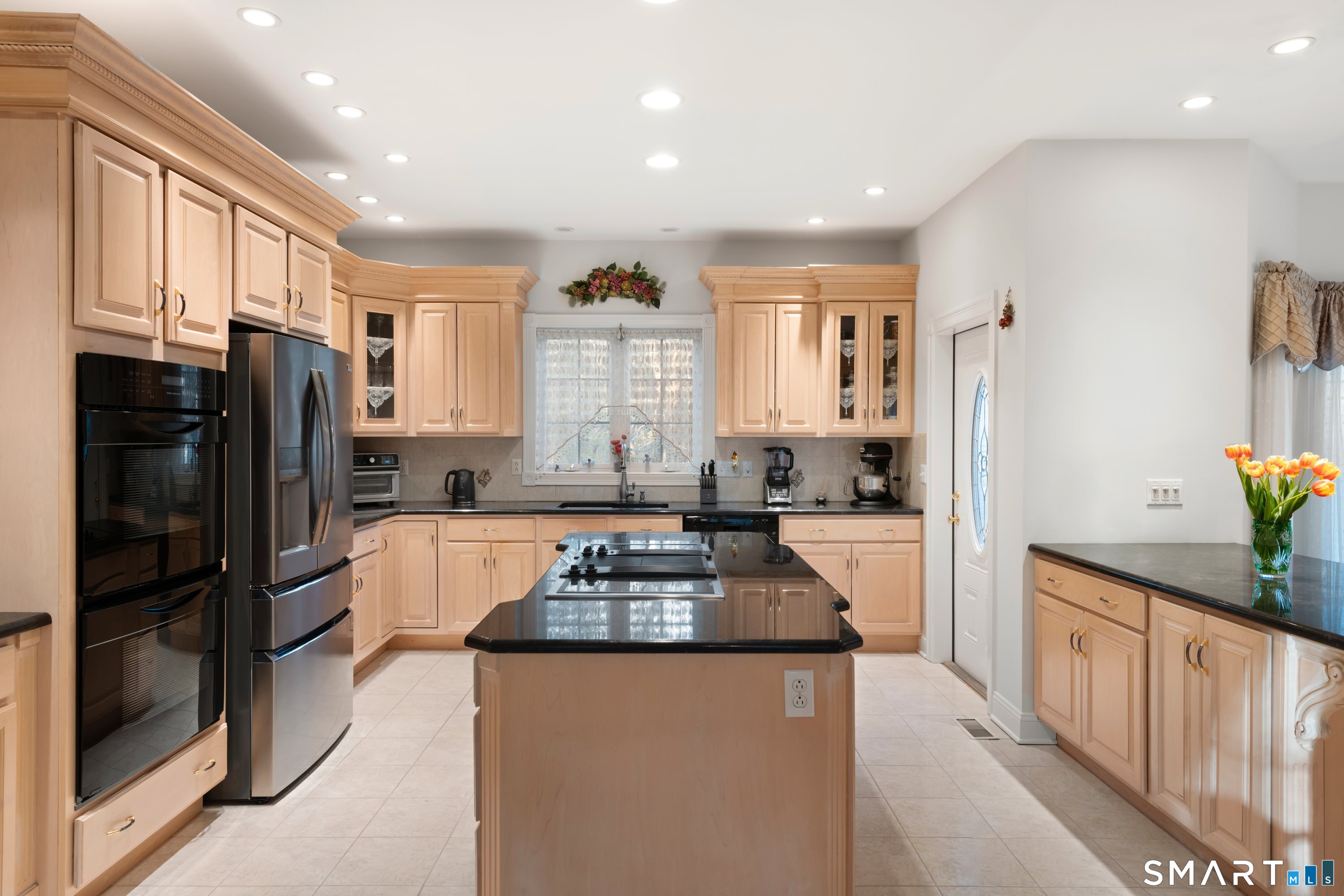 420 Summer Hill Road Madison, CT 06443 - Photo 18 of 40 a kitchen with refrigerator a stove and a refrigerator