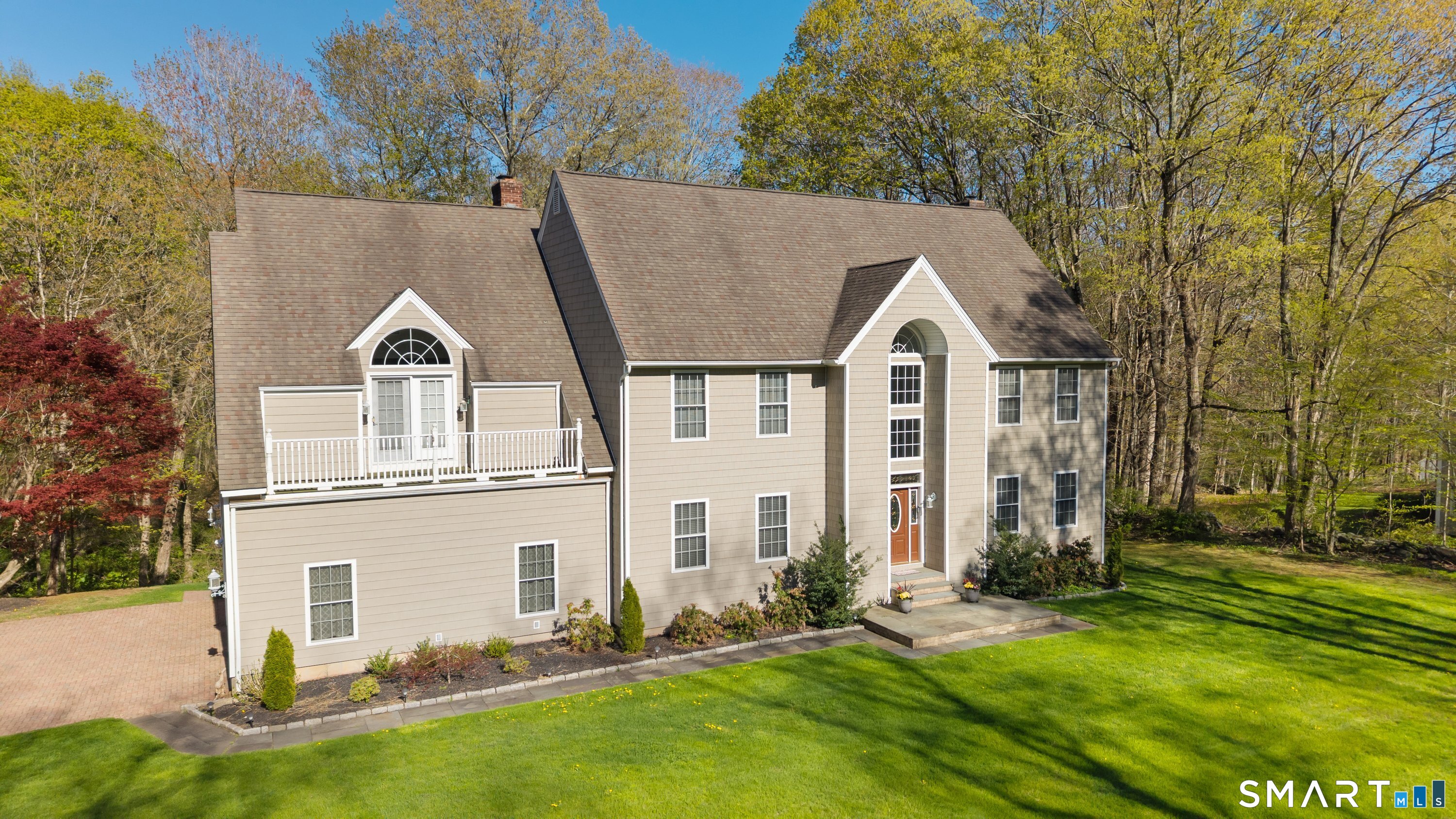 420 Summer Hill Road Madison, CT 06443 - Photo 6 of 40 a view of a house with a yard
