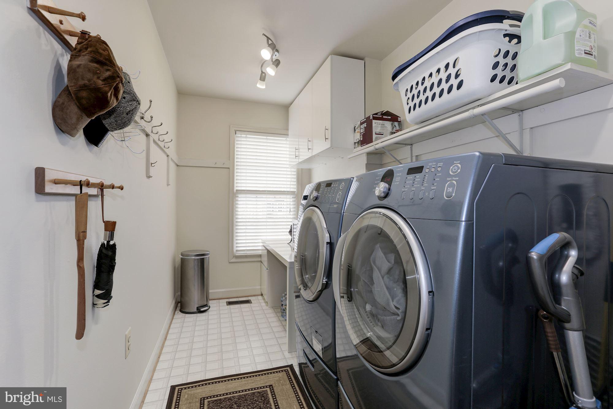 6402 Springhouse Circle Clifton, VA 20124 - Photo 16 of 30 a utility room with dryer and washer