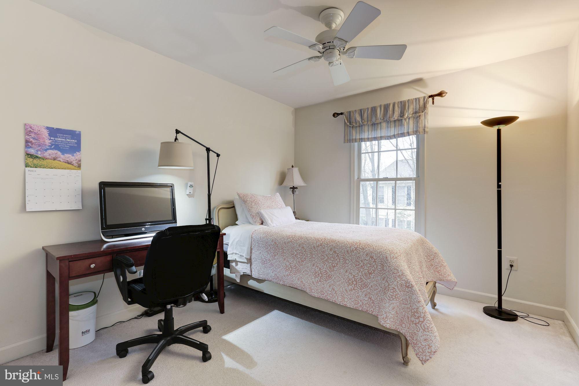 6402 Springhouse Circle Clifton, VA 20124 - Photo 23 of 30 a bedroom with a bed and a window