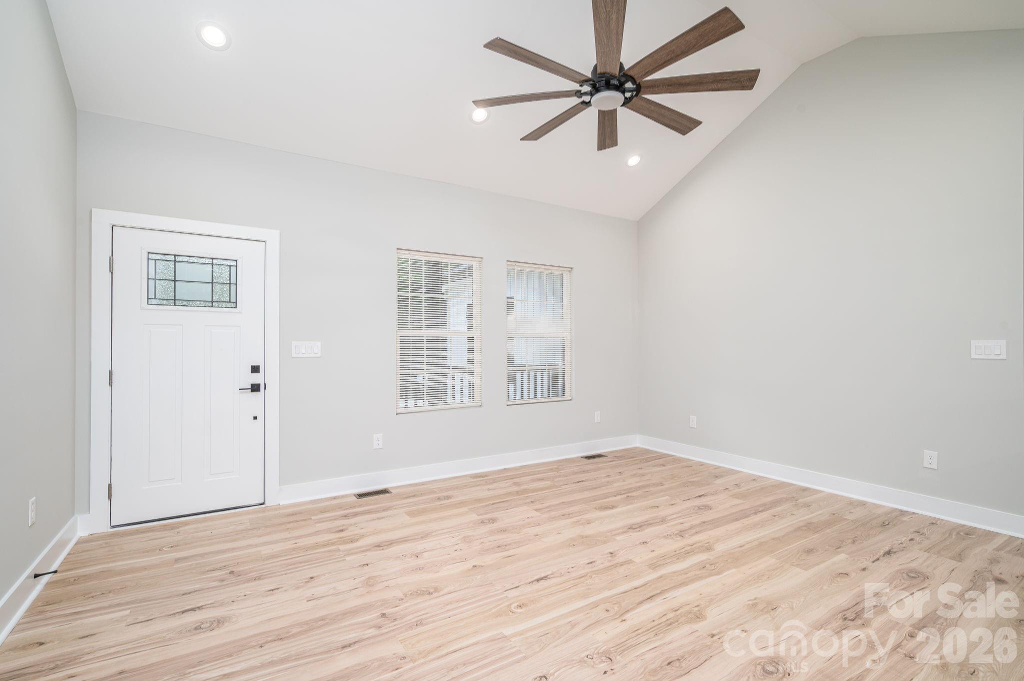 2474 Shoal Road Crouse, NC 28033 - Photo 12 of 39 wooden floor in an empty room with a window