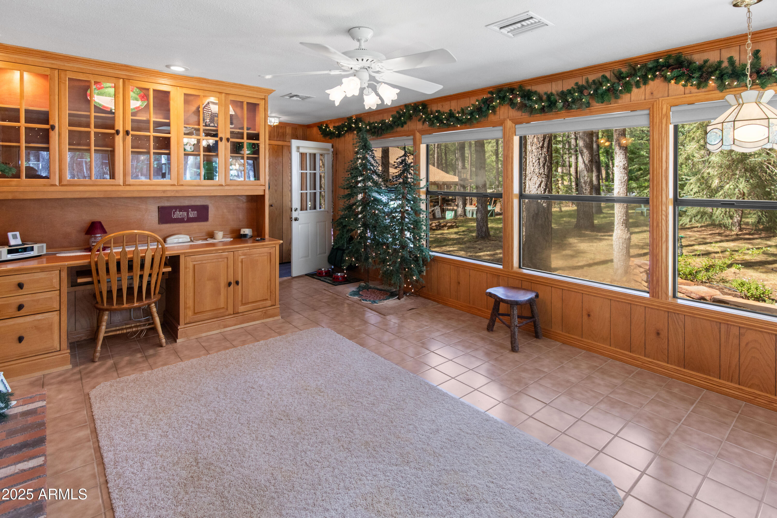 3910 Larson Loop Forest Lakes, AZ 85931 - Photo 22 of 57 a room with furniture and a large window