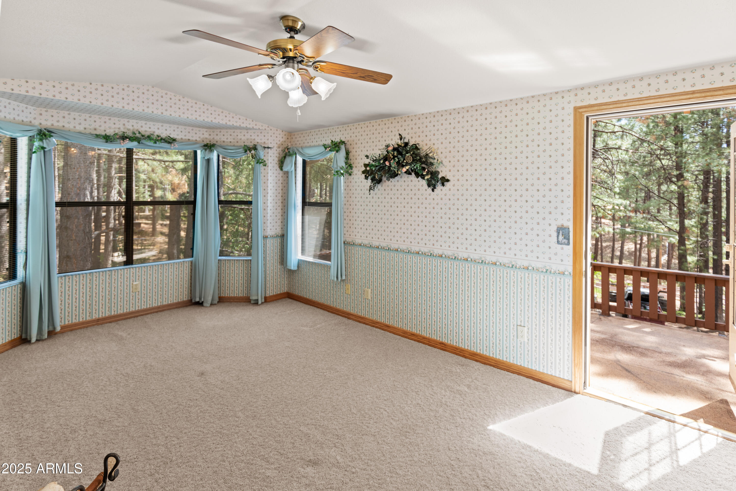 3910 Larson Loop Forest Lakes, AZ 85931 - Photo 34 of 57 wooden floor in an empty room with a window
