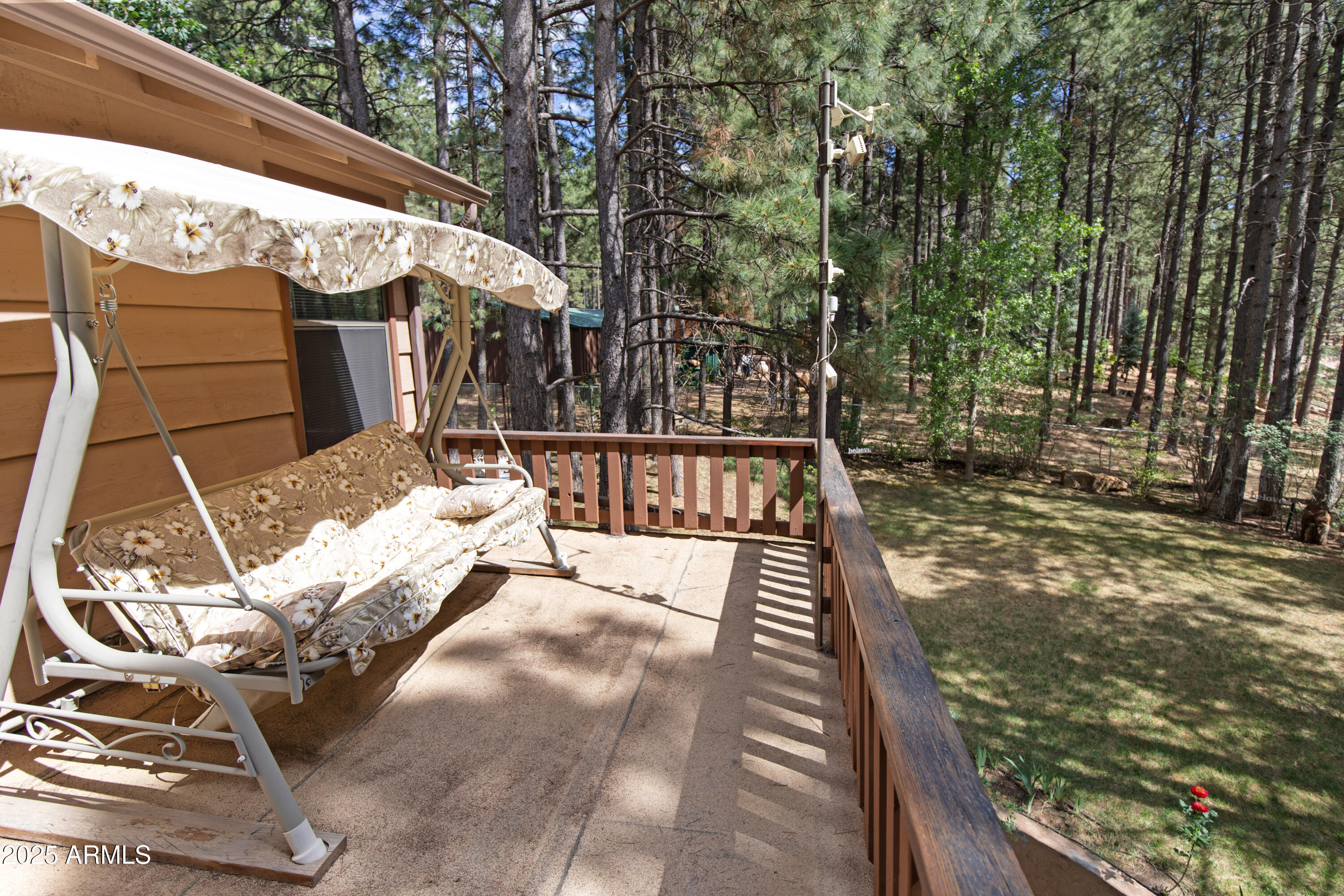 3910 Larson Loop Forest Lakes, AZ 85931 - Photo 35 of 57 a view of a patio with table and chairs