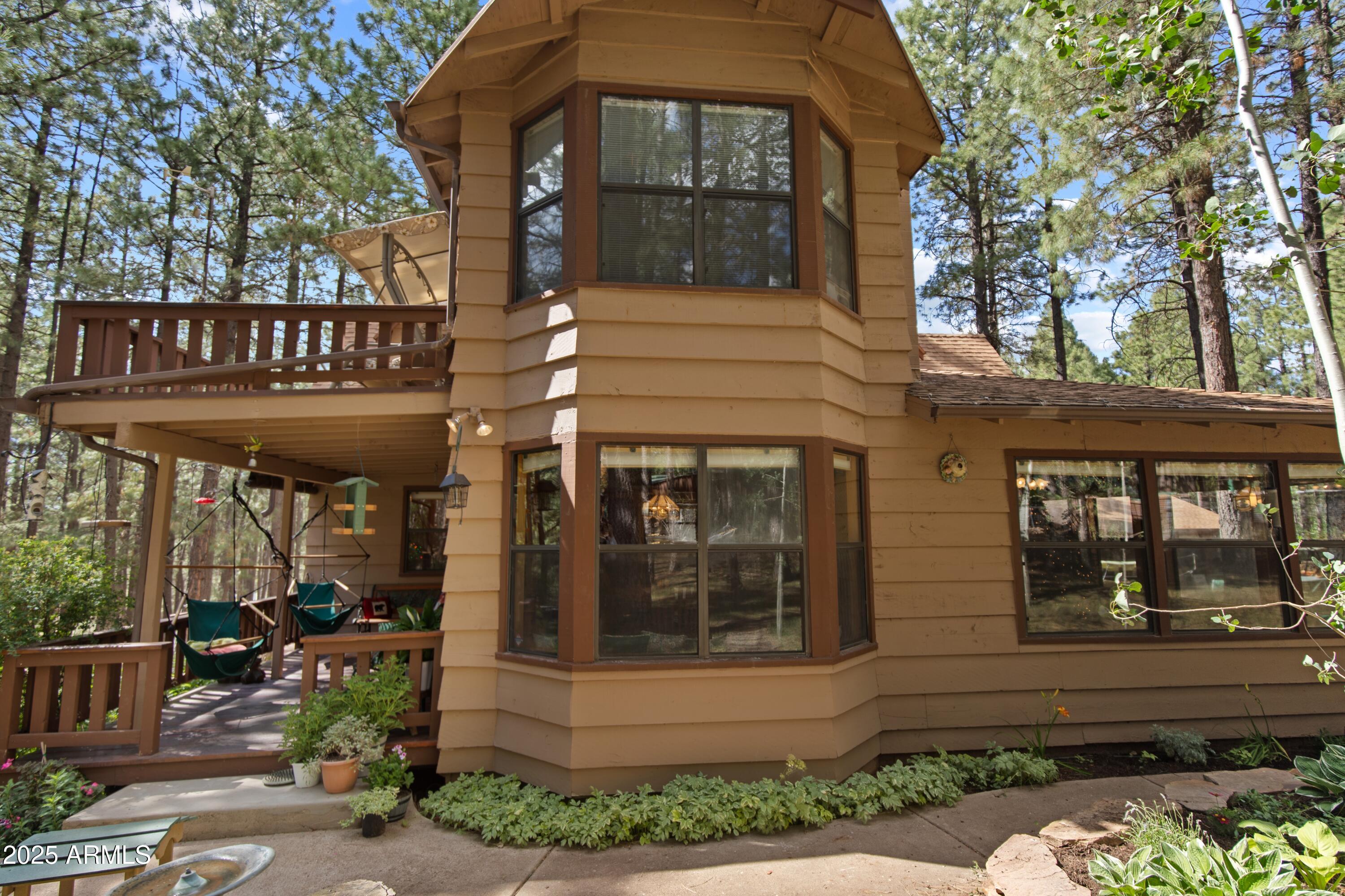 3910 Larson Loop Forest Lakes, AZ 85931 - Photo 7 of 57 a front view of a house