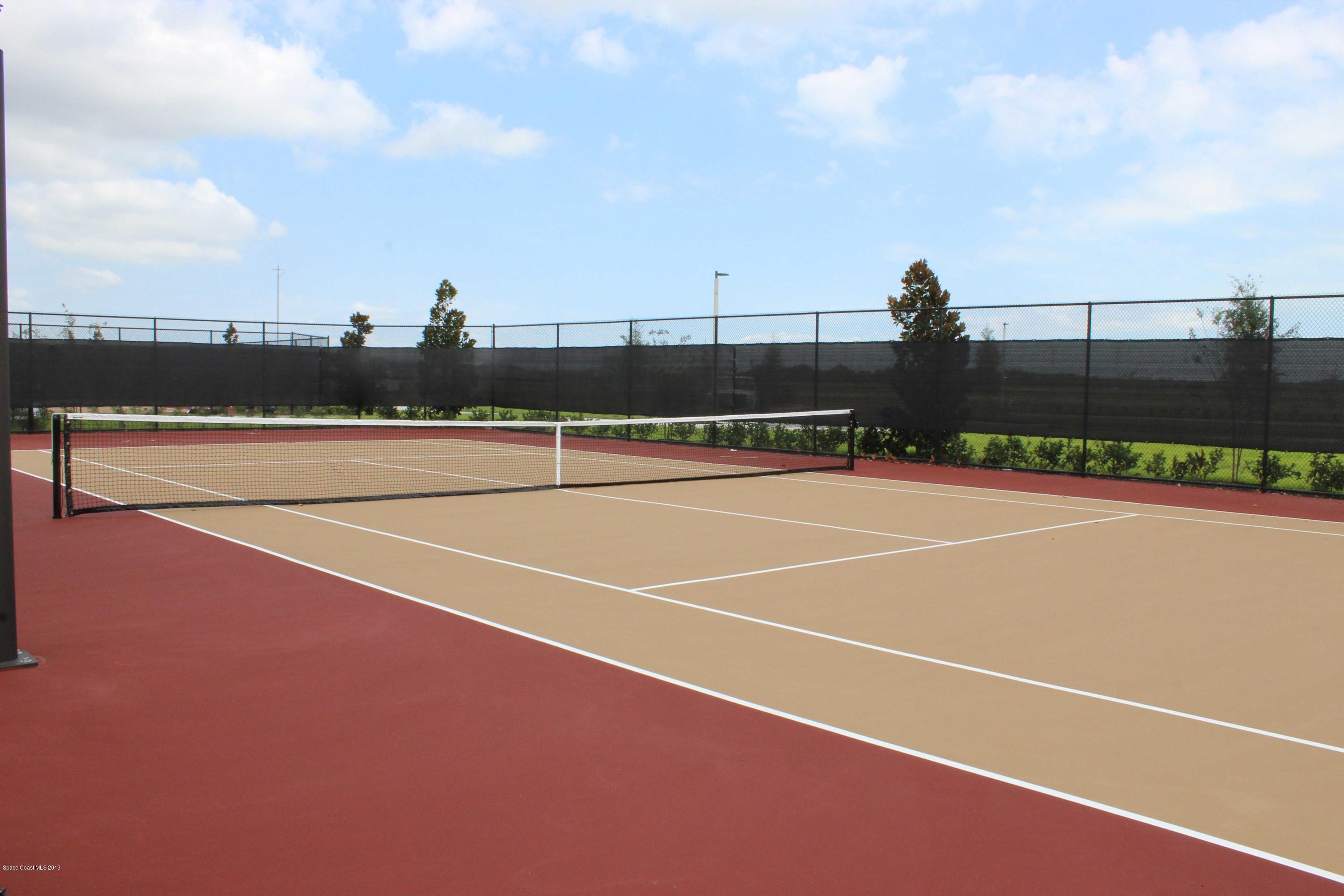 3094 Hummingbird Way Melbourne, FL 32940 - Photo 31 of 35 a view of a tennis court