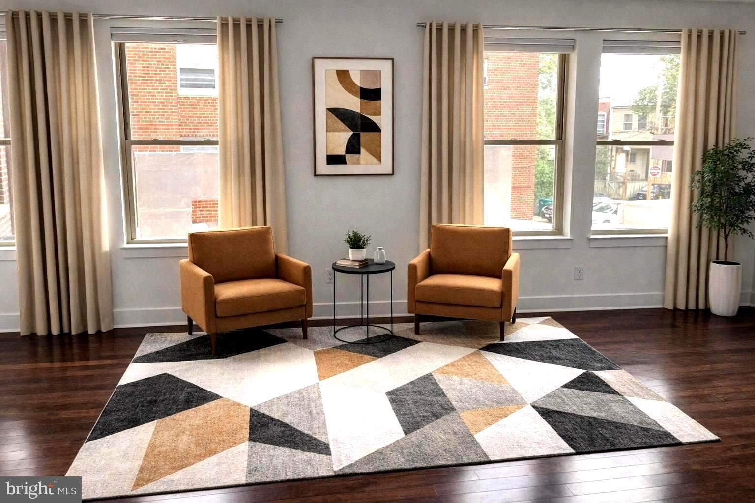 1020 Monroe Street Northwest, Unit 204 Washington, DC 20010 - Photo 2 of 29 a living room with furniture and a window