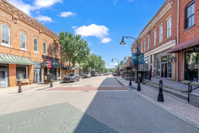 a view of a building with a street
