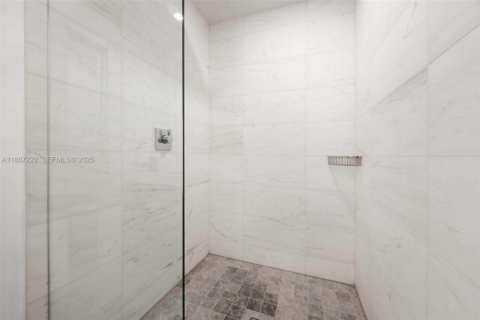202 Sunrise Drive, Unit 202C Key Biscayne, FL 33149 - Photo 20 of 32 a bathroom with a shower