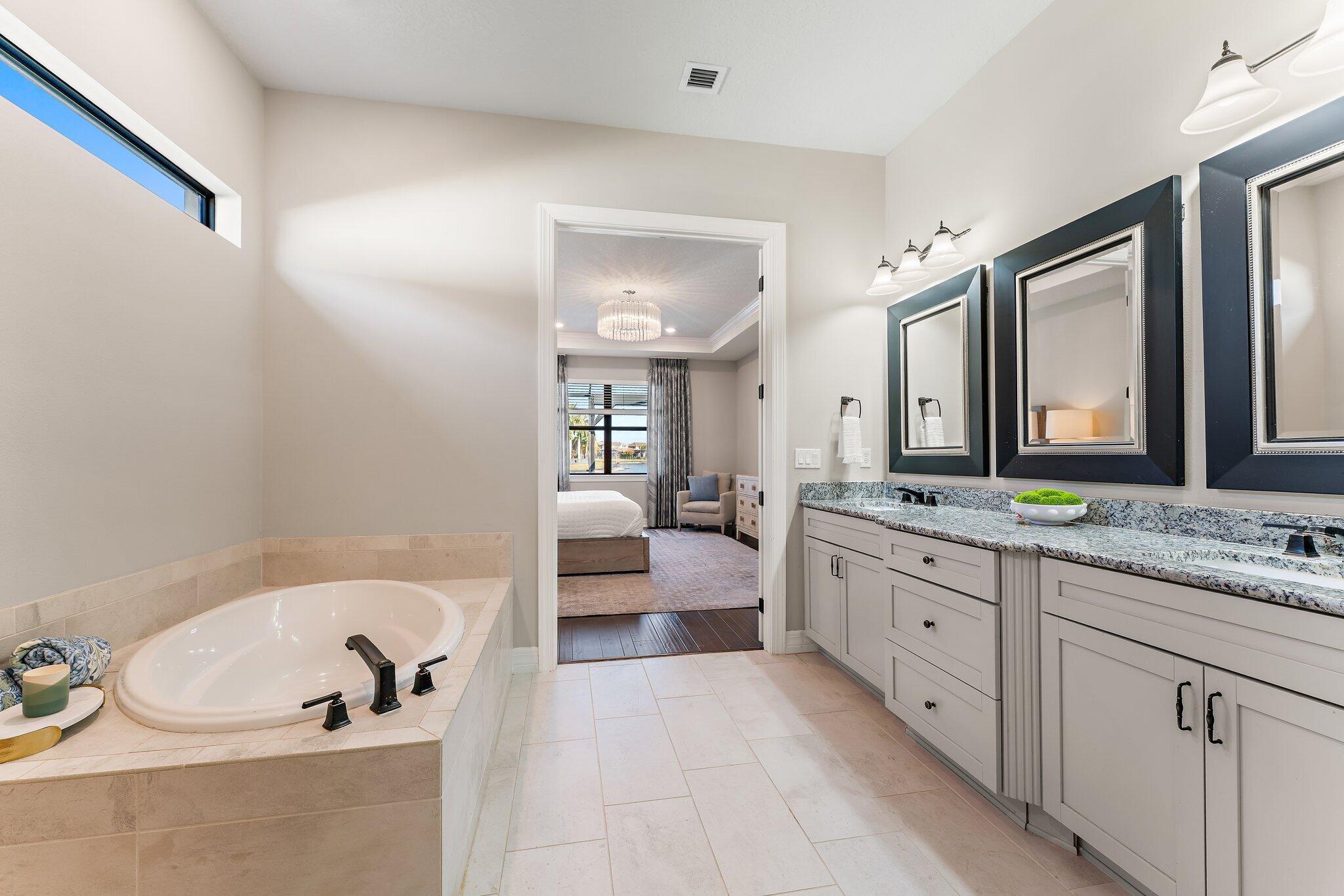 125 Indigo River Point Jupiter, FL 33478 - Photo 25 of 46 Primary Bathroom into Primary Bedroom