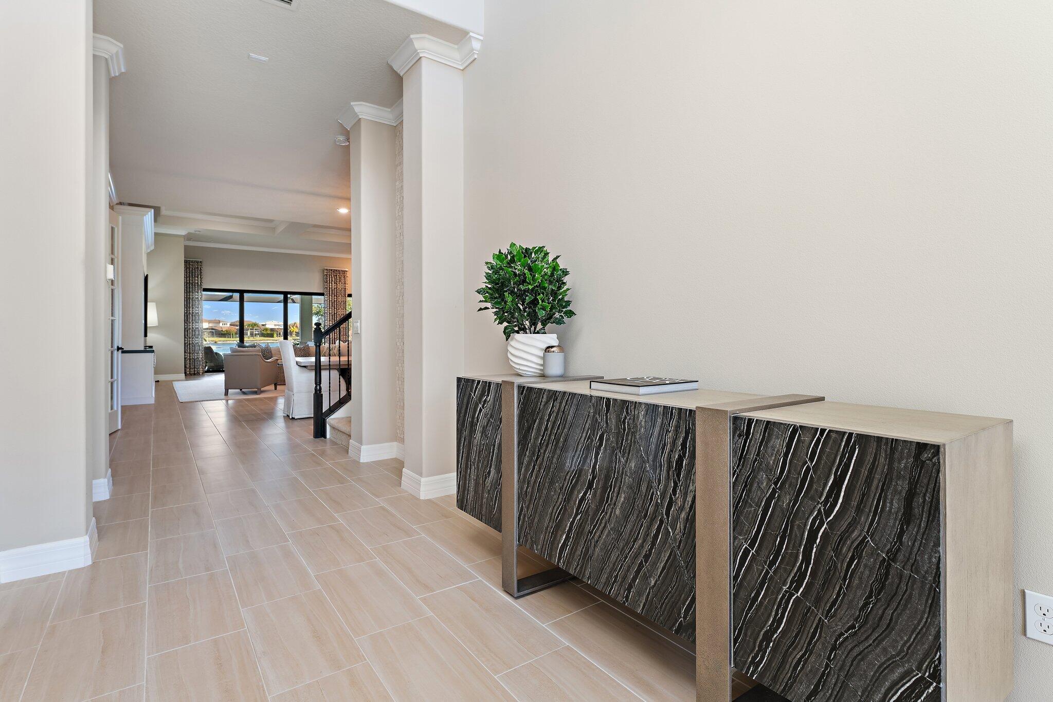 125 Indigo River Point Jupiter, FL 33478 - Photo 9 of 46 Front Door looking into Living Room
