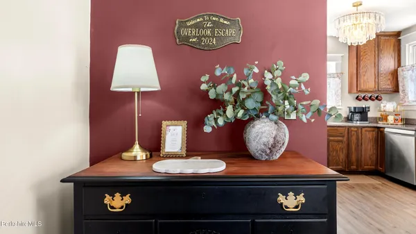 a view of living room with furniture and flowers