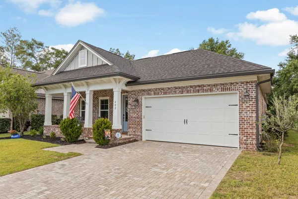 front view of house with a yard