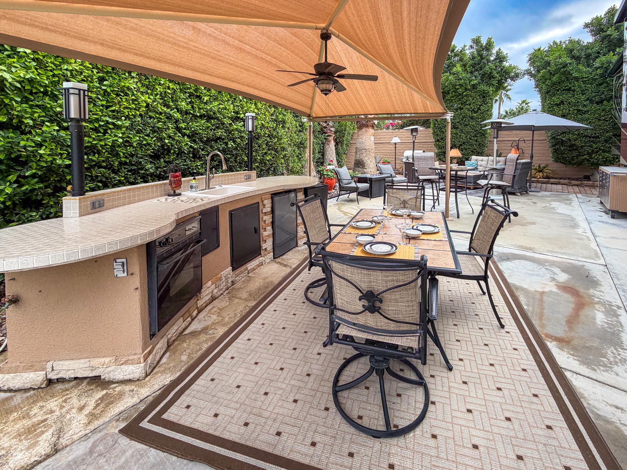 80394 Ave 48, Unit 90 Indio, CA 92201 - Photo 22 of 29 a view of a chairs and tables in the balcony
