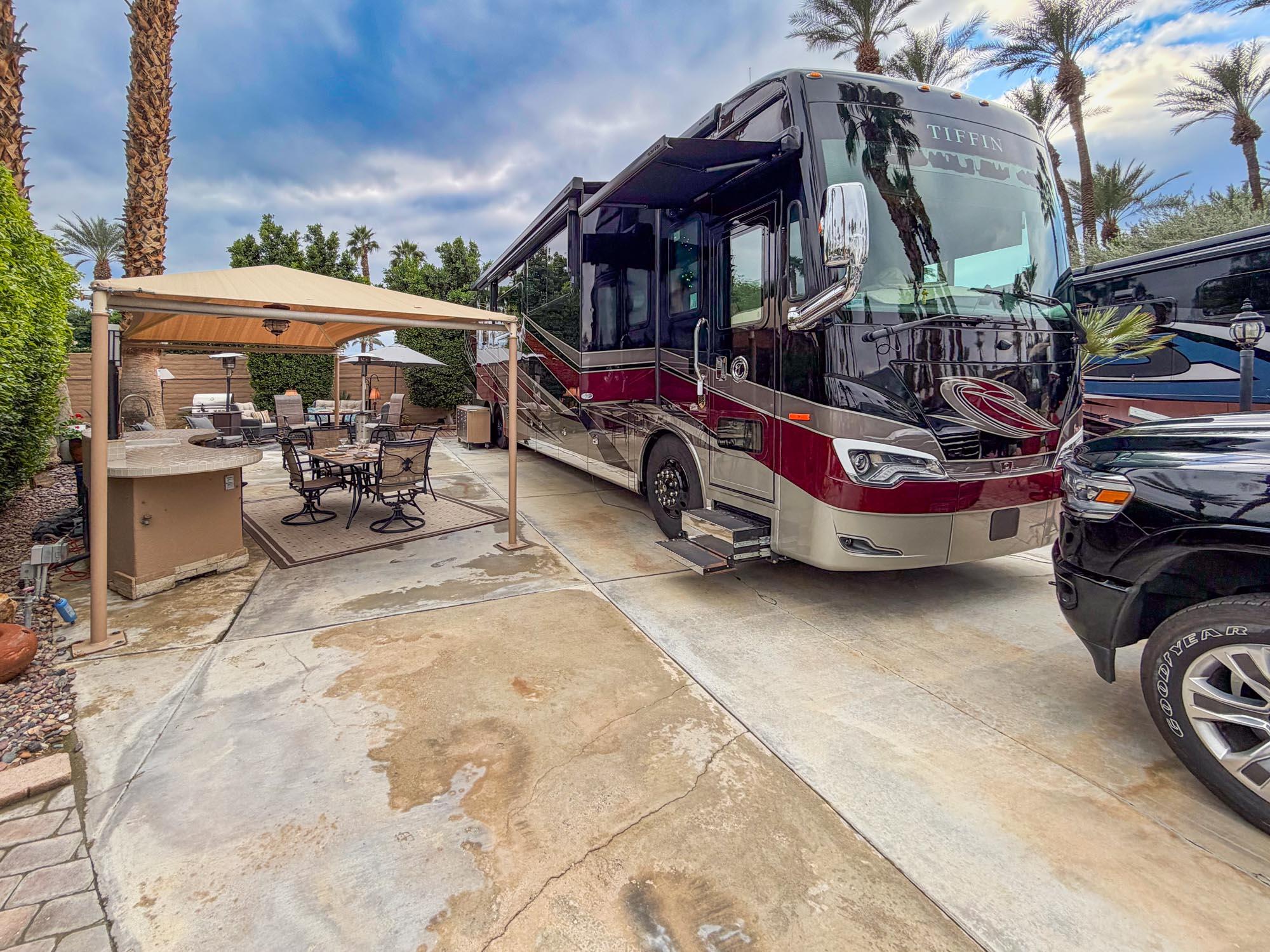 80394 Ave 48, Unit 90 Indio, CA 92201 - Photo 23 of 29 a view of a patio with a table and chairs